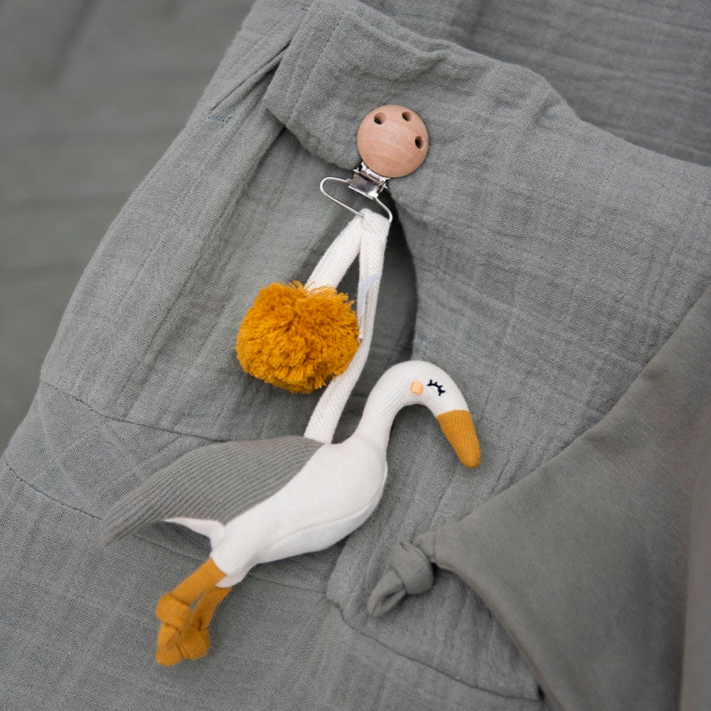 Brinquedo sensorial para o carrinho Garça