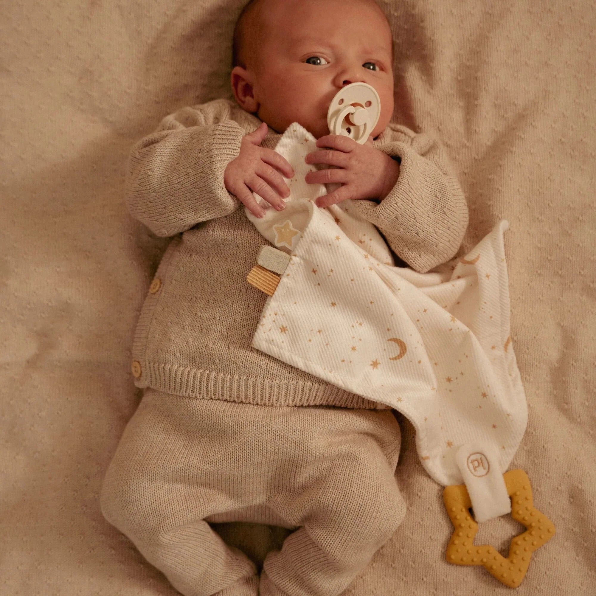 Paninho doudou com anel de dentição