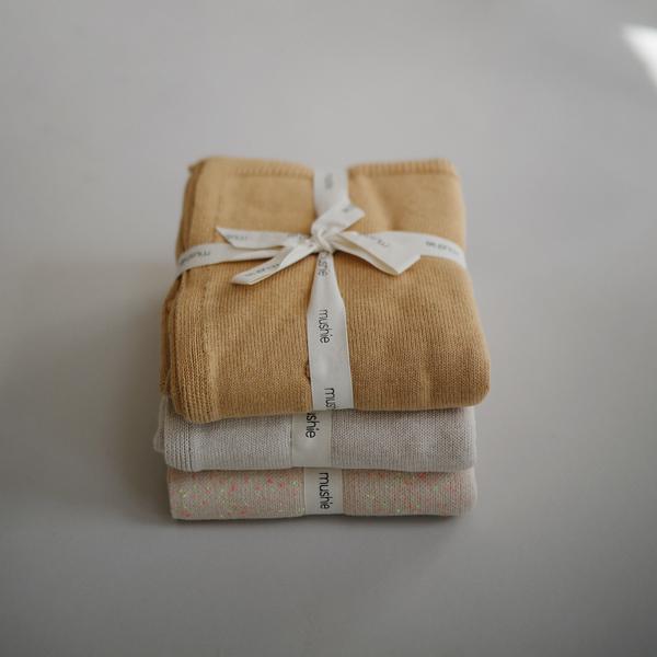 Manta de bebé textured dots white melange mushie Blanket mushie