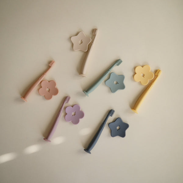 Flower training toothbrush cambridge blue mushie toothbrush mushie