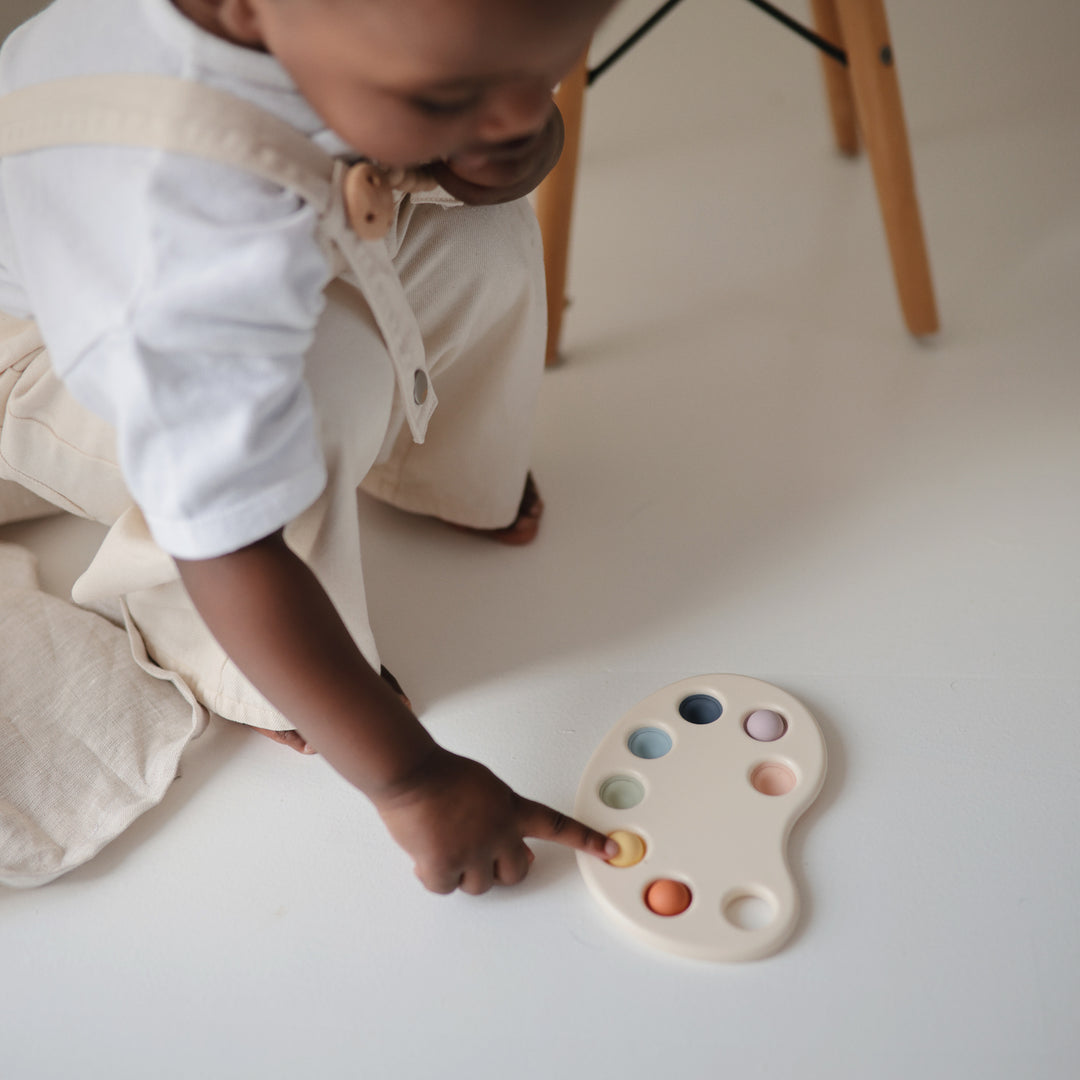 Paint palette press toy mushie Toys mushie