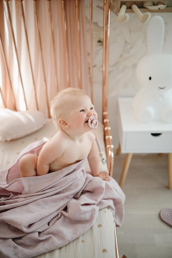 Muslin swaddle soft mauve mushie muslin mushie