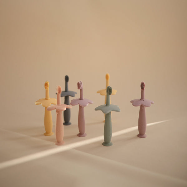 Flower training toothbrush tradewinds mushie toothbrush mushie