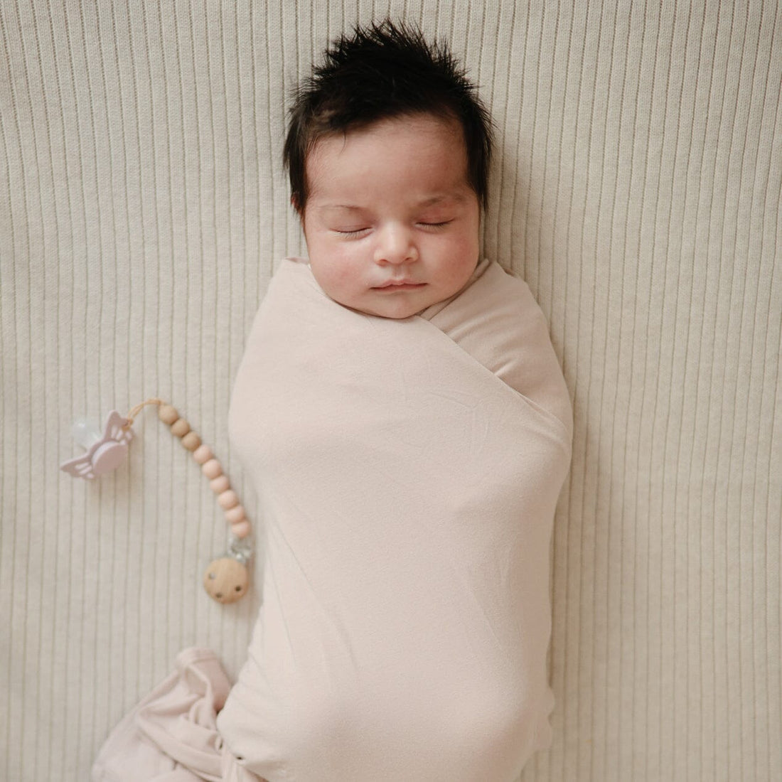 Manta de bebé ribbed bege melange muslin mushie