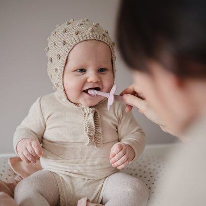 Flower training toothbrush soft lilac mushie toothbrush mushie 