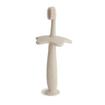 Flower training toothbrush shifting sand mushie toothbrush mushie 