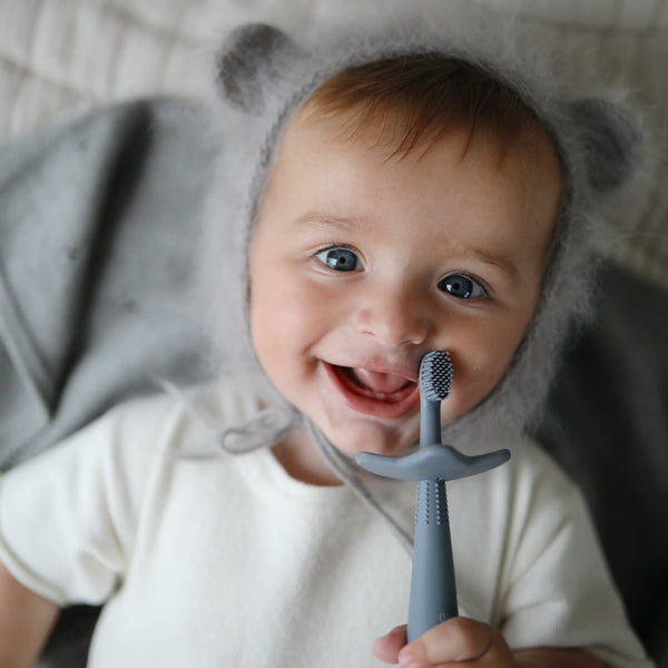 Flower training toothbrush tradewinds mushie toothbrush mushie